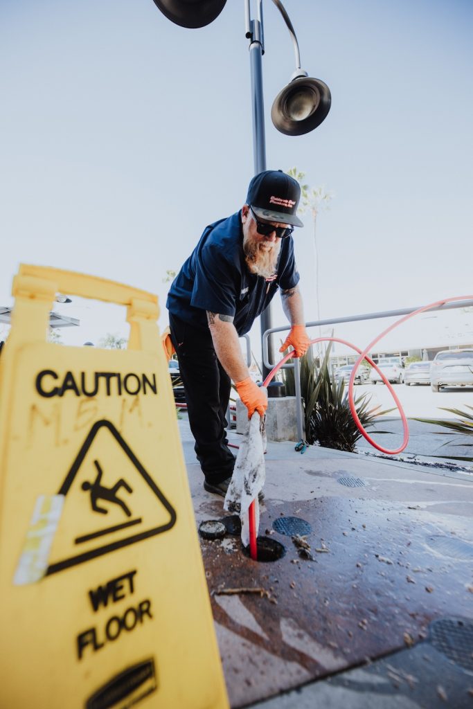 Expert hydro jetting service removing stubborn blockages from a restaurant's sewer line