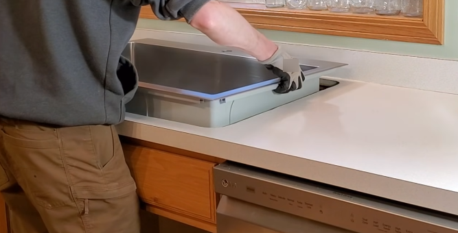 Test-fitting and installing the new sink