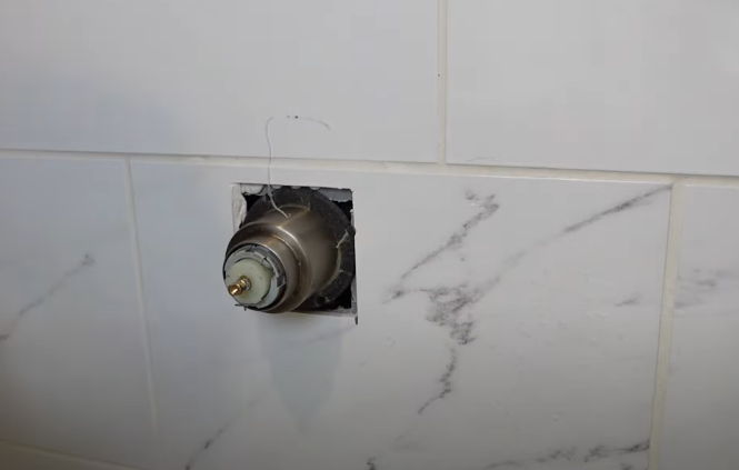 Removing the metal collar in the shower handle