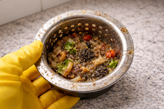 Gunk in sink strainer