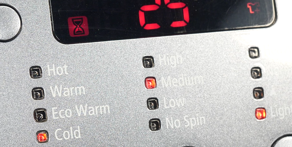 Selecting Eco mode to conserve water when washing clothes