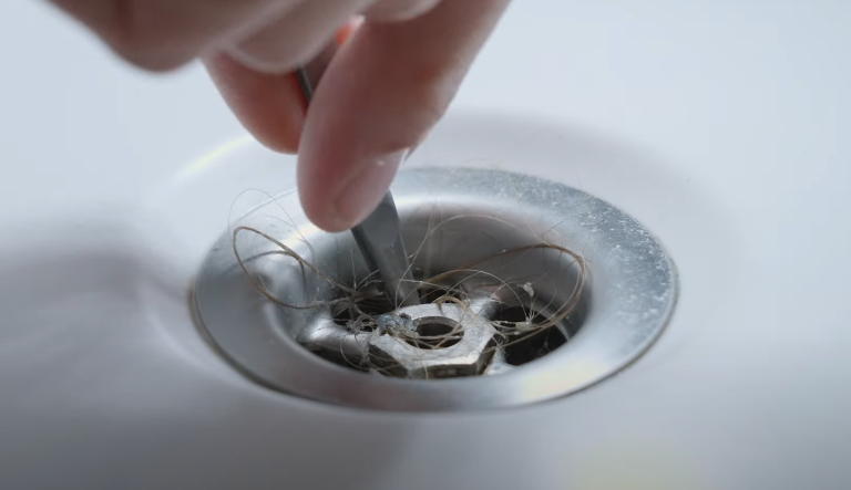 clogged sink causing smell