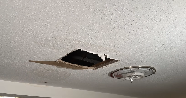 Water damaged drywall ceiling